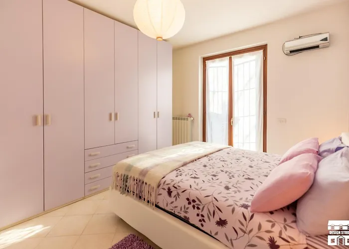 Purple House By Design Colico